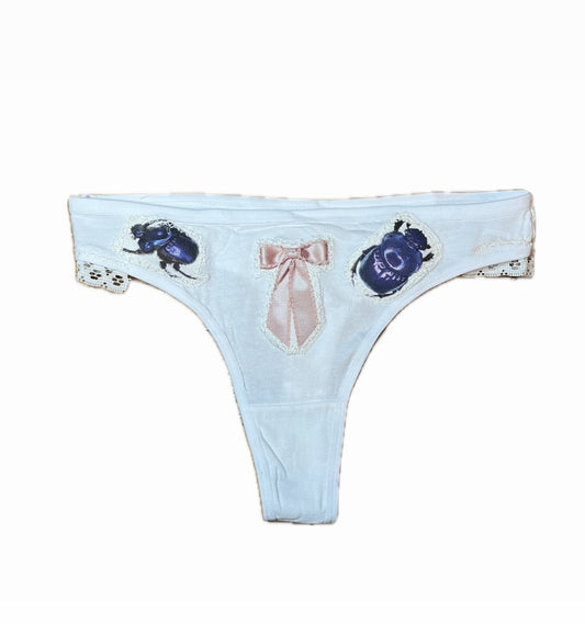 blue beetle pink bow thong